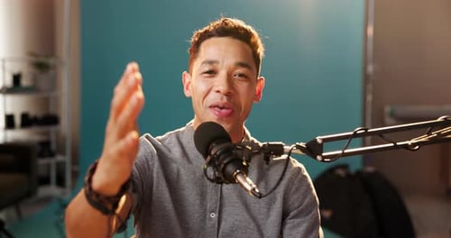 Talking, microphone and content creator with face of man for live streaming, influencer or podcast