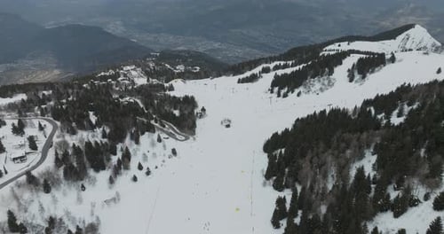 Aerial view of snowy ski resort in the Dolomites, South Tyrol, Italy.