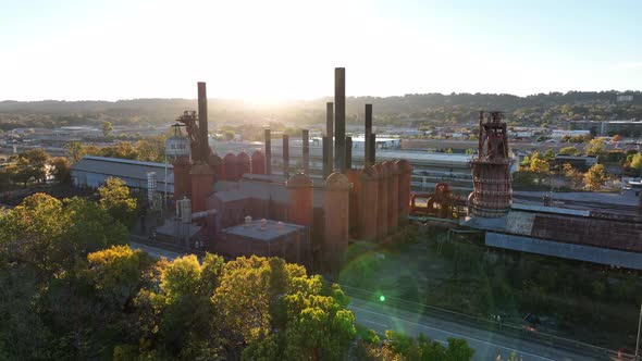 USA blast furnace at magic hour light. Aerial silhouette of chimneys ...