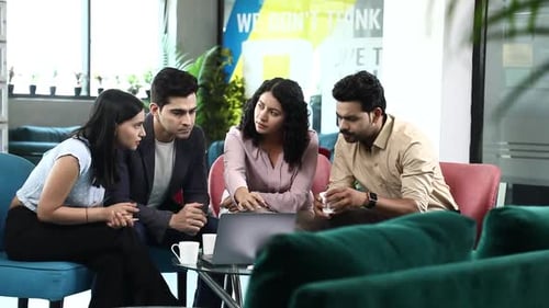 Video of business team discussing new projects at office while drinking coffee or tea