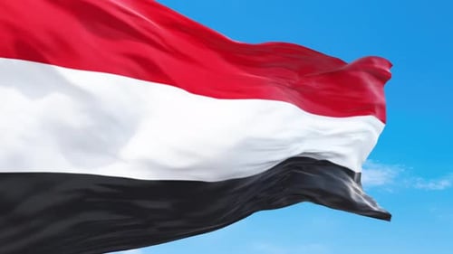 Realistic Yemen Flag Waving Against Blue Sky Loop