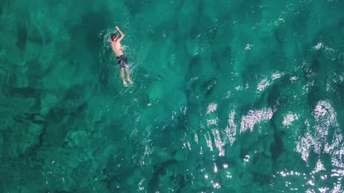 Man swimming in ocean