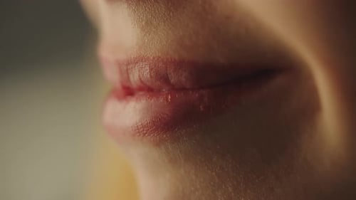 Woman smiling with close-up on lips