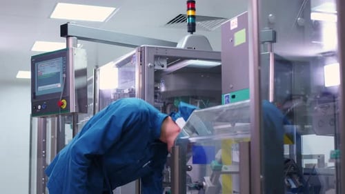 Engineer Control Pharmaceutical Manufacturing. Factory Worker Operating Pharmaceutical Equipment. Ph