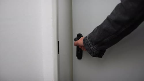 Hand Is Opening Fire Rated Door