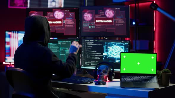 Hacker Doing Computer Sabotage Using Trojan Ransomware on Green Screen ...