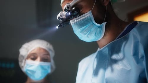 Medical Team Performs Surgical Operation