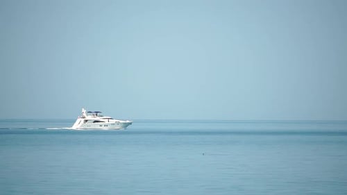 Aerial Yacht on Calm Sea Luxury Cruise Trip View of White Boat on Deep Blue Water Aerial View of