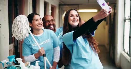 Smiling Volunteers Posing for Selfie After Cleaning