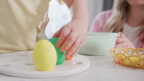 Kids Create Easter Eggs with Vibrant Paints