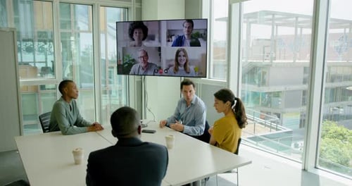 Businesspeople Having a Video conference in a Office Meeting room