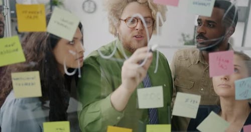 Team Collaborating on Project in Modern Office