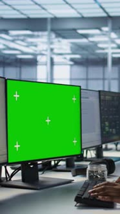 Vertical Video Data Center Technician Using Mockup PC Maintaining Company Network