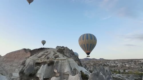 Hot Air Balloons Floating over Cappadocia Landscape