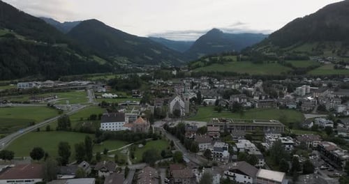 Aerial view of picturesque town in valley, Italy.