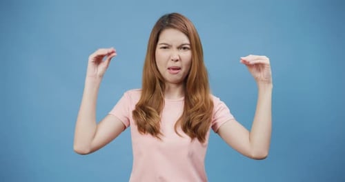Woman Expressing Frustration and Exasperation with Hand Gestures