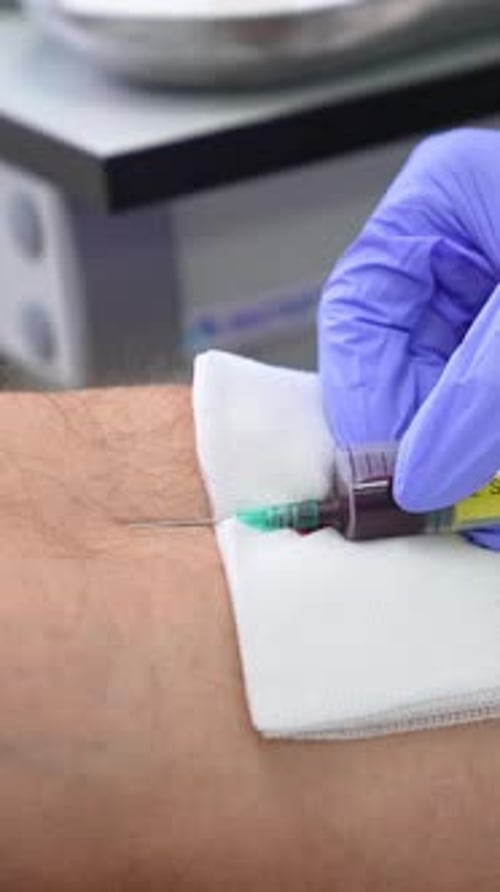 Taking blood for analysis in a hospital.