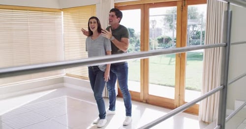 Happy Couple Celebrate New Home Purchase