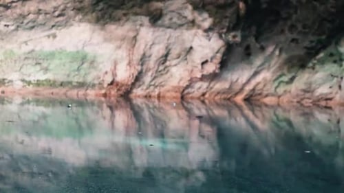 Natural Pool Reflection with Gentle Ripples