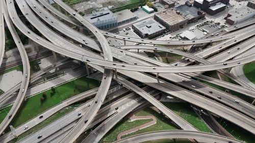 Drone Top Down Wide View on Famous Road Intersection with Traffic on Multiple Flyovers
