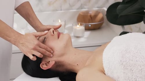 Woman's facial massage close up