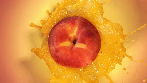 Super Slow Motion of Explosion Peach and Burst Juice