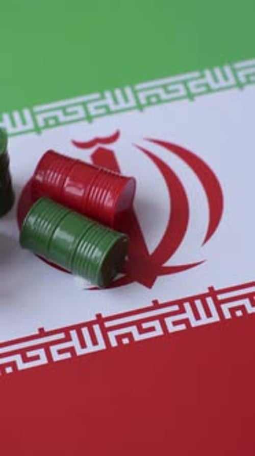 Metal barrels of oil, gas, or chemicals on the Iranian flag, Iran production. Barrels of Iranian oil
