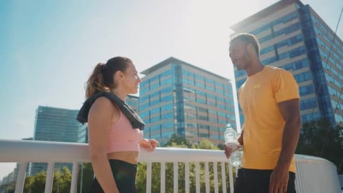 Young Adults Exercising Together in Urban Environment