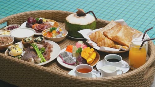 Floating Breakfast in Swimming Pool on Villa in Luxury Resort
