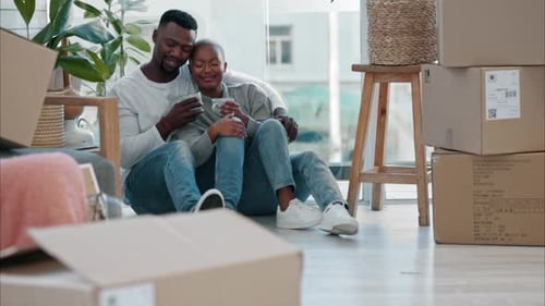 Couple, home and floor with coffee after moving to new building, flat or apartment