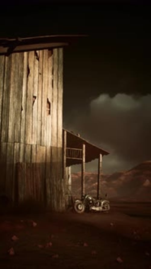 Motorcycle Parked in Front of Barn
