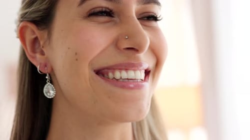 Bride in White Gown Looking at Wedding Ring