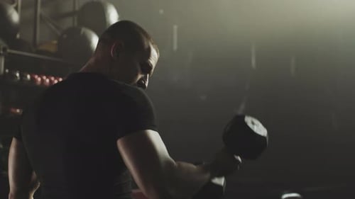 Man working out with dumbbells