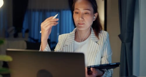 Woman Working From Home On Video Call