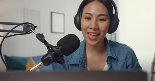 Woman Speaking Into Microphone for Podcast
