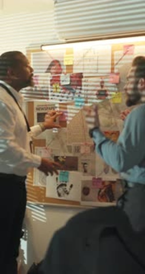 Arguing, detectives and men with board, police station and debating with evidence for case