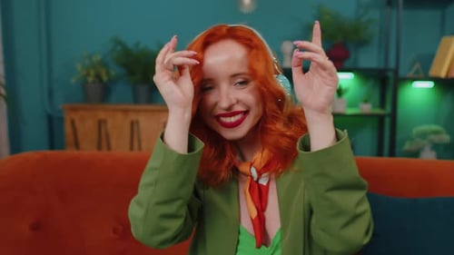 Stylish Woman Listens to Music Indoors