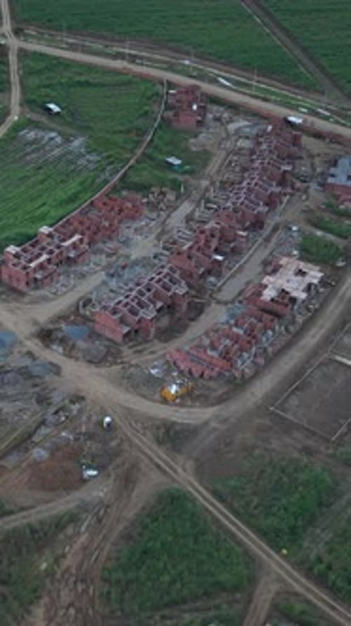 Aerial View of Urban Construction Site in Vertical Format
