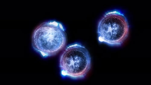 Glowing Abstract Cell Division Particle Animation Loop