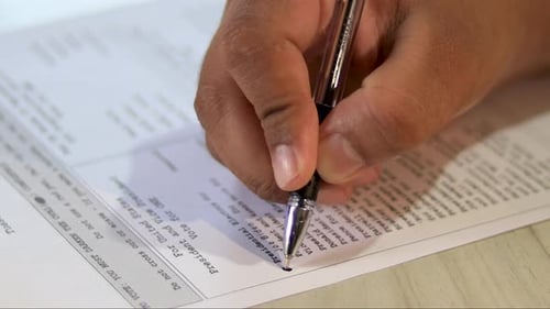 Filling out Election Ballot with Pen Close Up