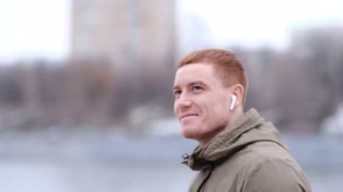 Handsome Serious Beauty Male Model Closeup Portrait Young Guy in the City Street Cold Blue Tones in