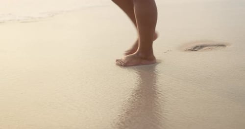 Feet, legs and walk on beach sand with travel, vacation on tropical island with ocean for peace