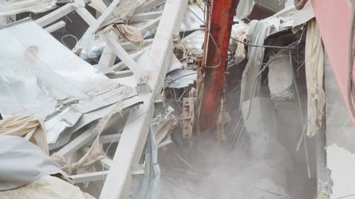 Excavator with Cutter Disassembles Debris Rubble of Arena