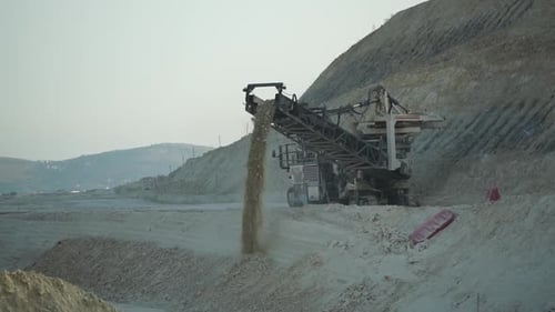 Earth Mover Cleans Up Soil for Road Renewal