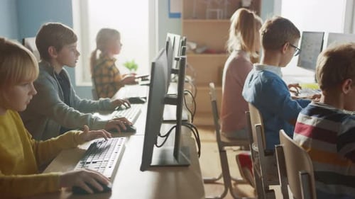 Elementary School Computer Science Classroom: Diverse Group of Little Smart Schoolchildren using Pe