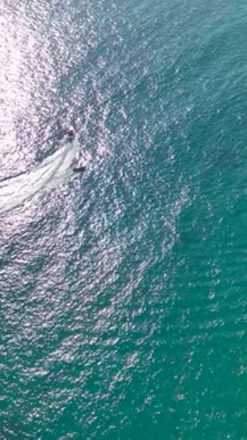 Vertical Video Azure Symphony Yachts Dancing on the Sea