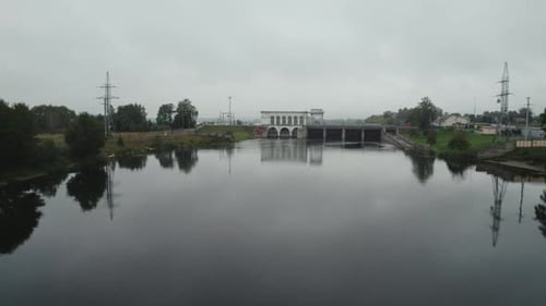 Small Power Plant on the River View From Height of the Dam System Energy Extraction Aerial View