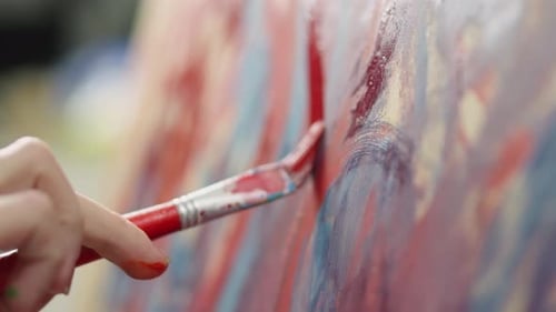 Closeup Red Kiss Paints on Canvas The Young Artistic Soul Creates Amazing Drawings on an Easel