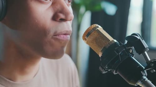 Close Up Mouth of Young African American Man Near Condenser Microphone