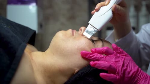 Woman Receiving Facial Treatment Close Up